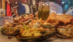 filipino boodle fight in Dubai seafood in a bucket