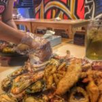 filipino boodle fight in Dubai seafood in a bucket