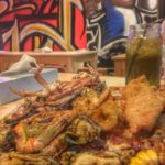 filipino boodle fight in Dubai seafood in a bucket