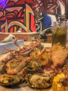 filipino boodle fight in Dubai seafood in a bucket