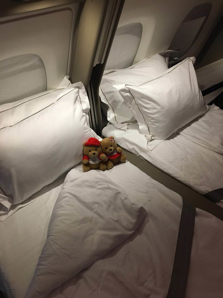 Singapore Airlines First Class suites bed teddy bear