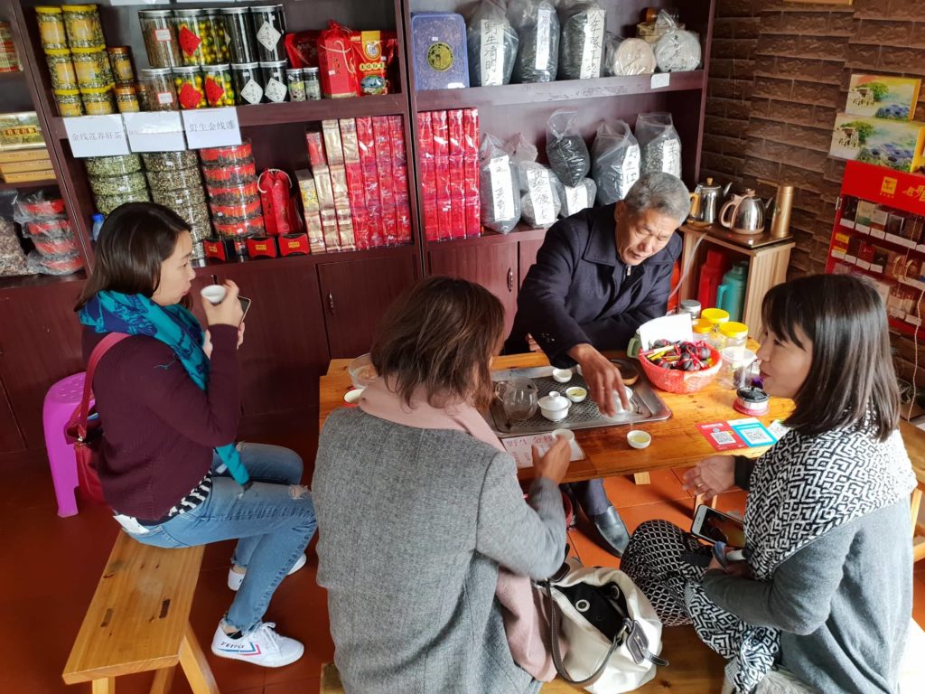 Sipping tea in  Yongding Hakka Tulou Fujian Xiamen