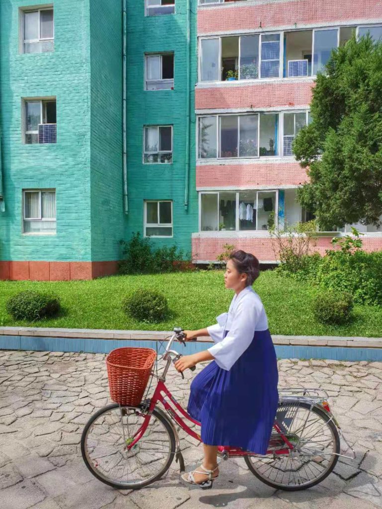 north korea kaesong girl cycling